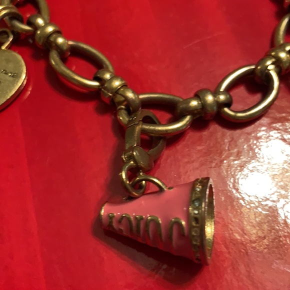 JUICY COUTURE 3 CHARM BRACELET. ONE NOT REMOVABLE